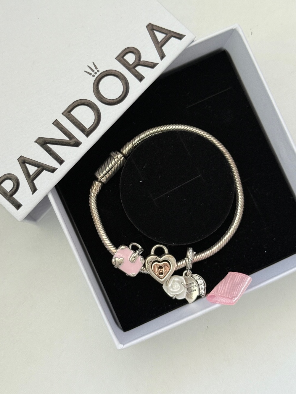 Authentic Pandora Silver Bracelet with charms